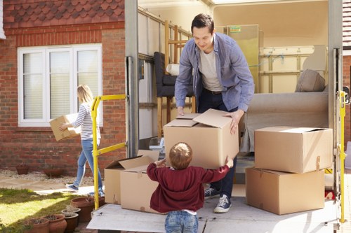Professional removalist team packing a house