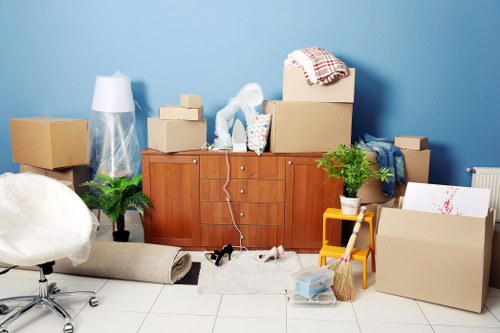 Experienced movers carefully unpacking and organizing items.