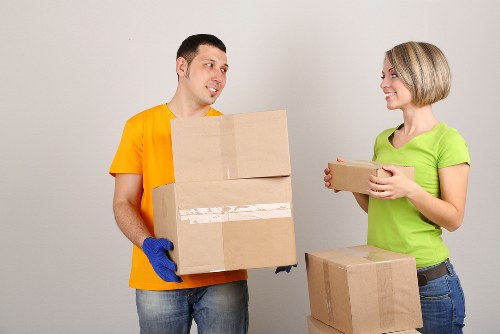 Removalists handling furniture